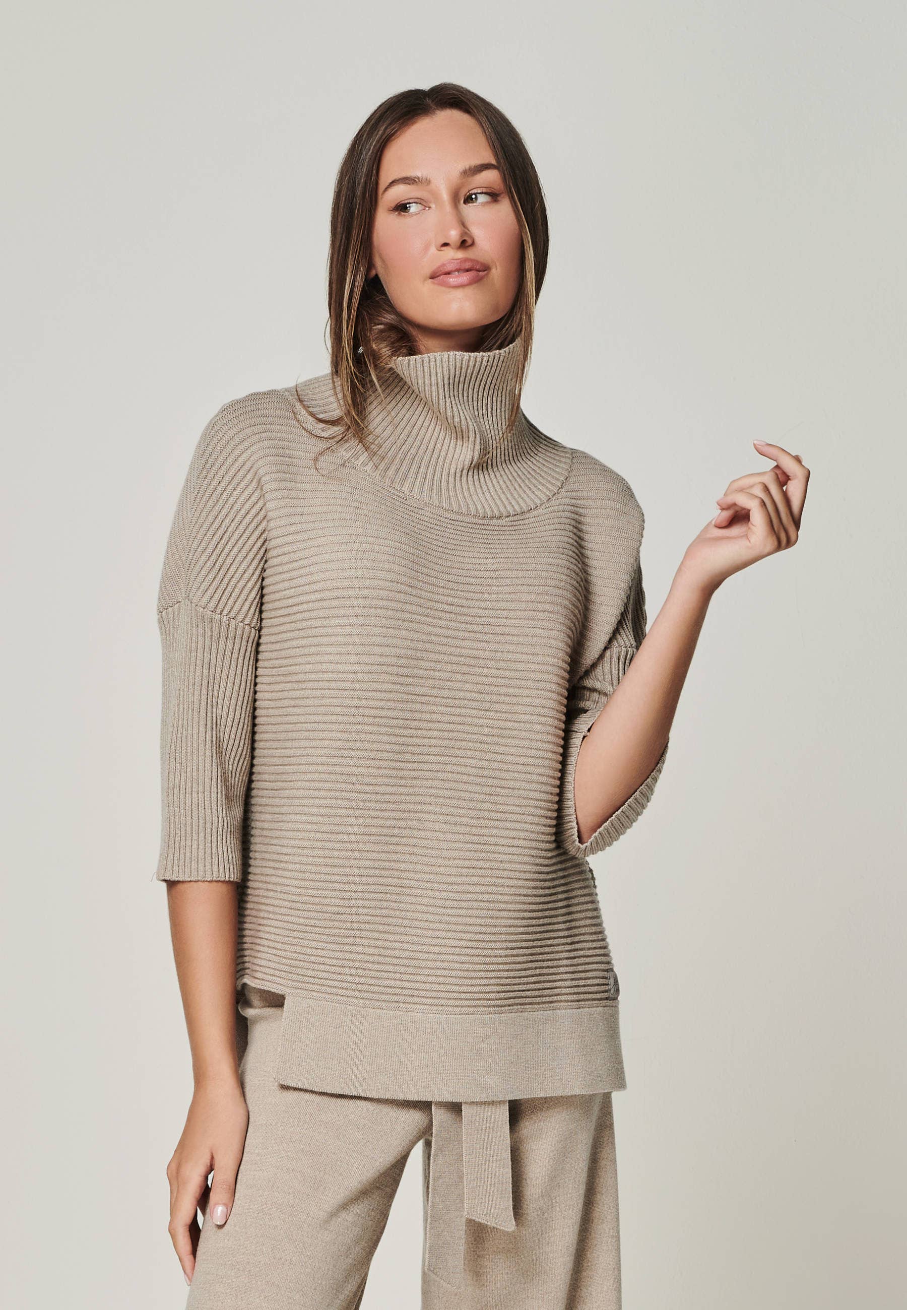 Women's capsule wardrobe essentials turtleneck front angle
