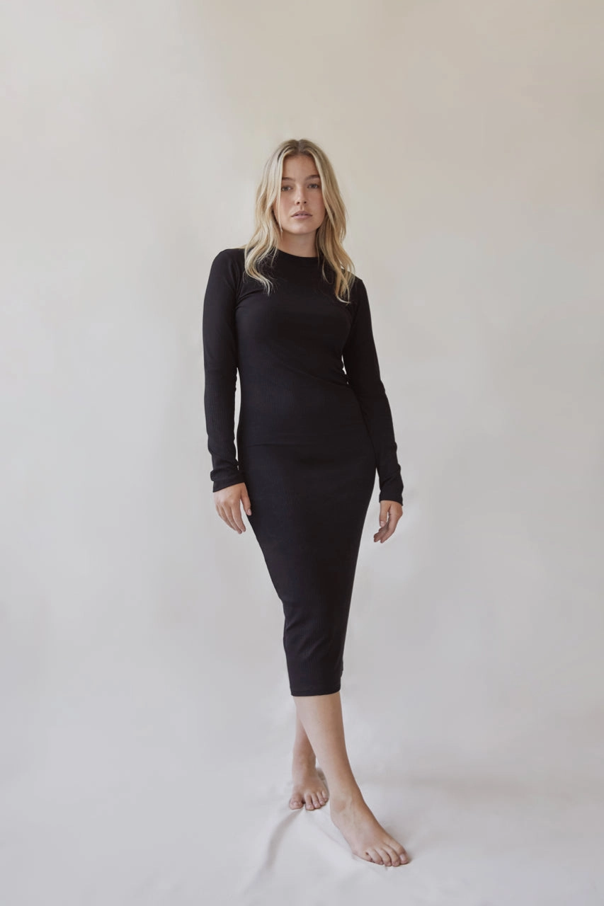 Women's capsule wardrobe essentials black dress front