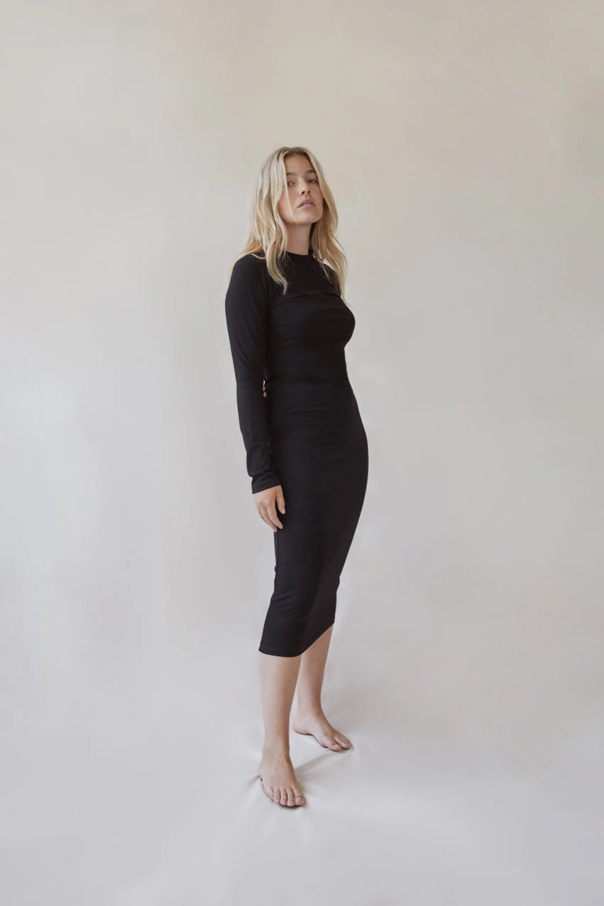 Women's capsule wardrobe essentials black dress angle